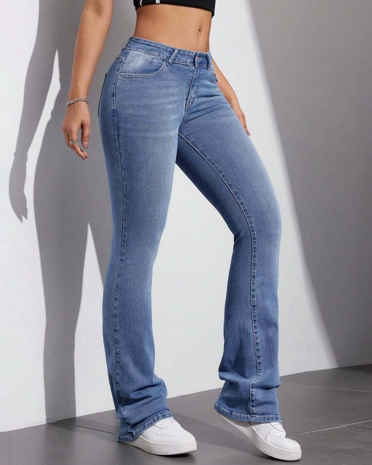 Flvsun low rise bell bottom jeans for women, stretchy material, stylish flared jeans for casual wear.