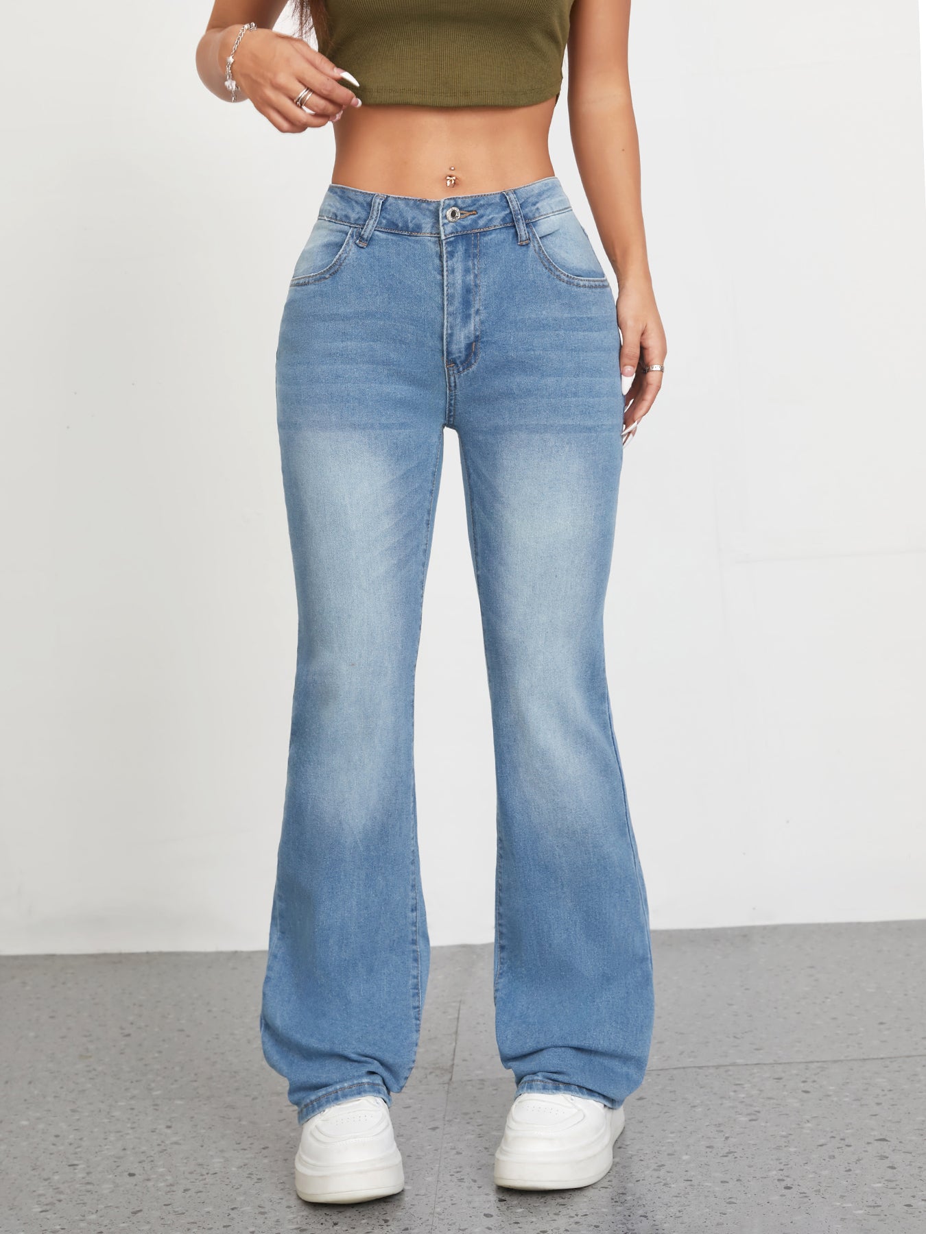 Flvsun women's low rise bell bottom jeans in light wash with a comfortable fit for casual wear.