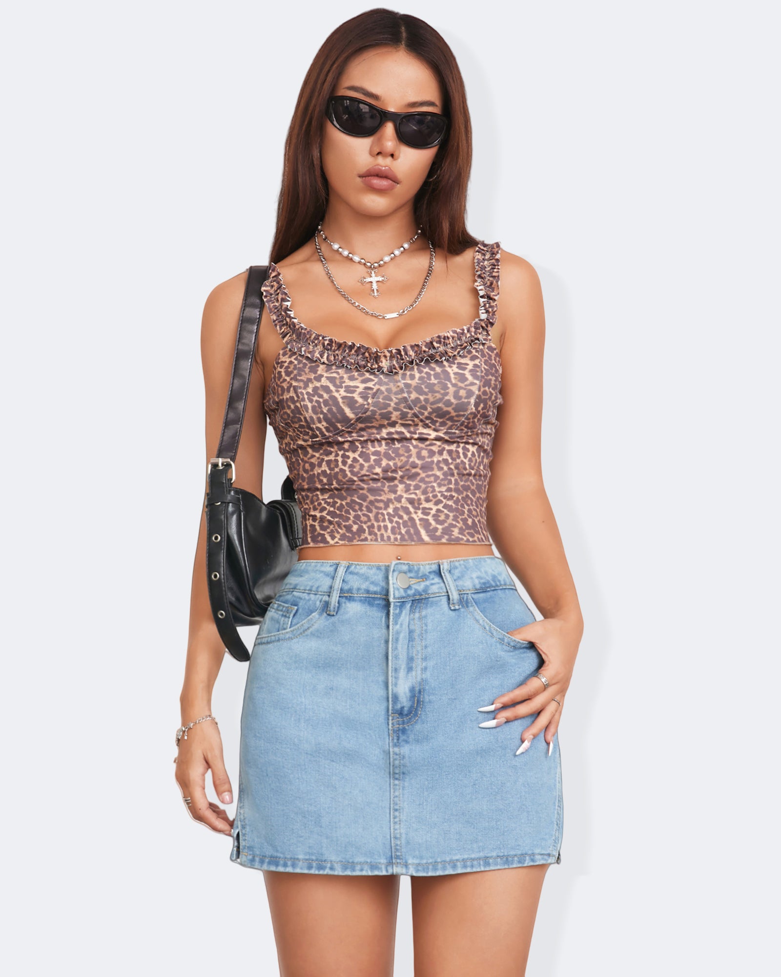 Model wearing Flvsun-Denim Skorts Skirts Womens High Waisted Denim Mini Skorts with animal print top and sunglasses.